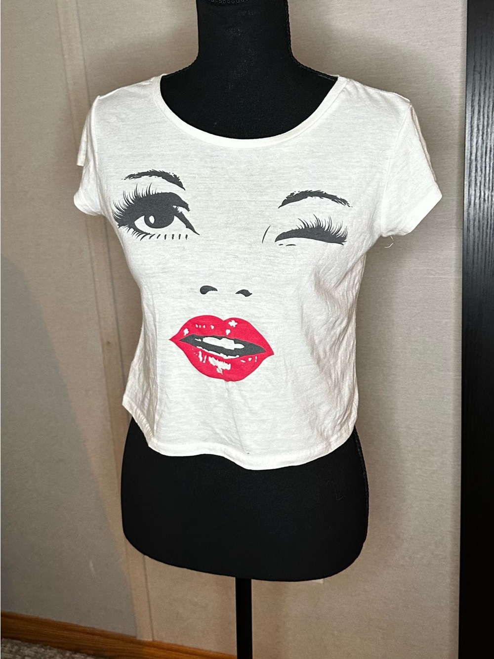 Corner Shop White Crop Tee with Black Face Graphic and Red Lip